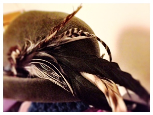 feathered hat from charity shop